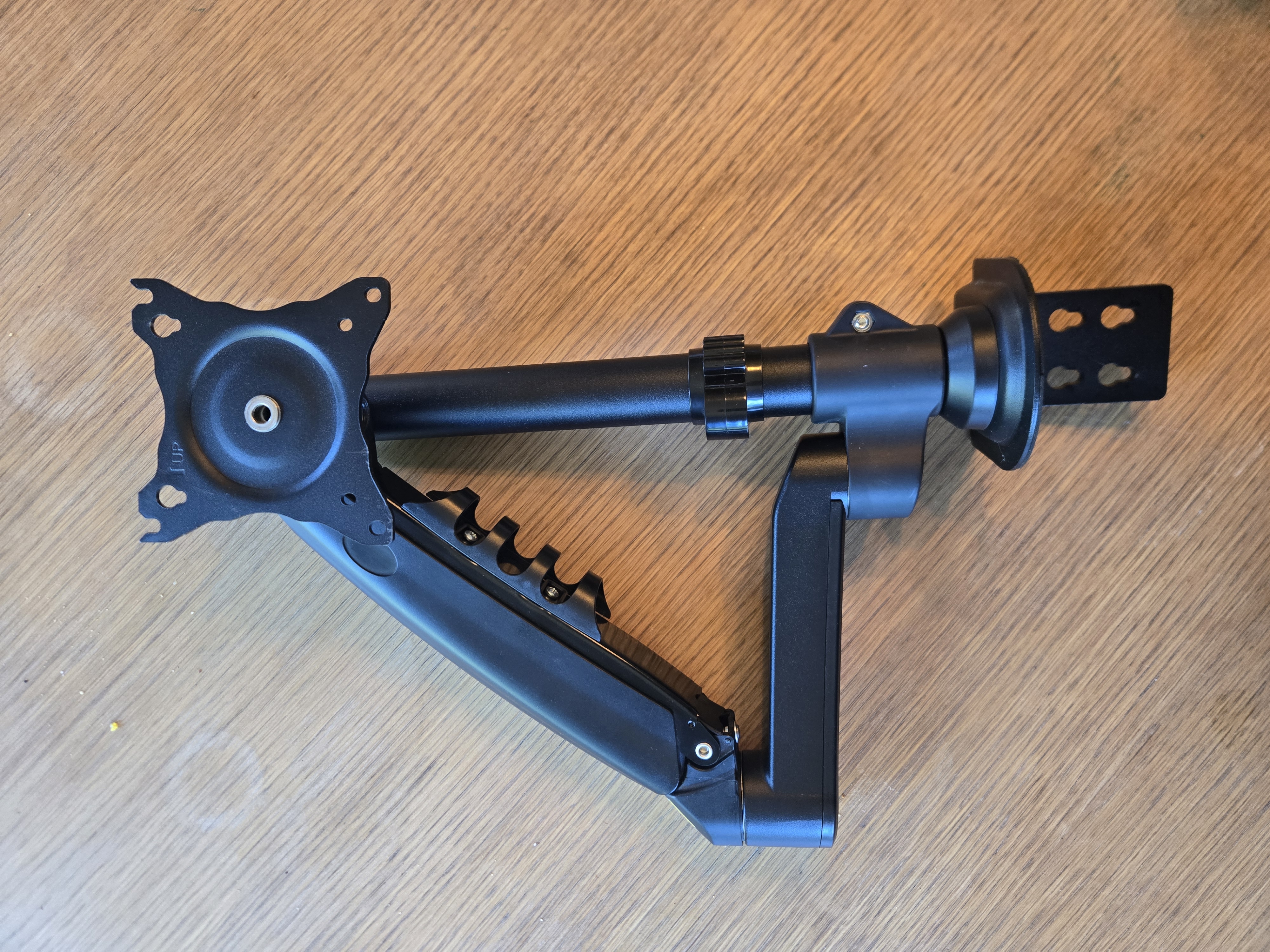 The monitor arm, C-clamp removed